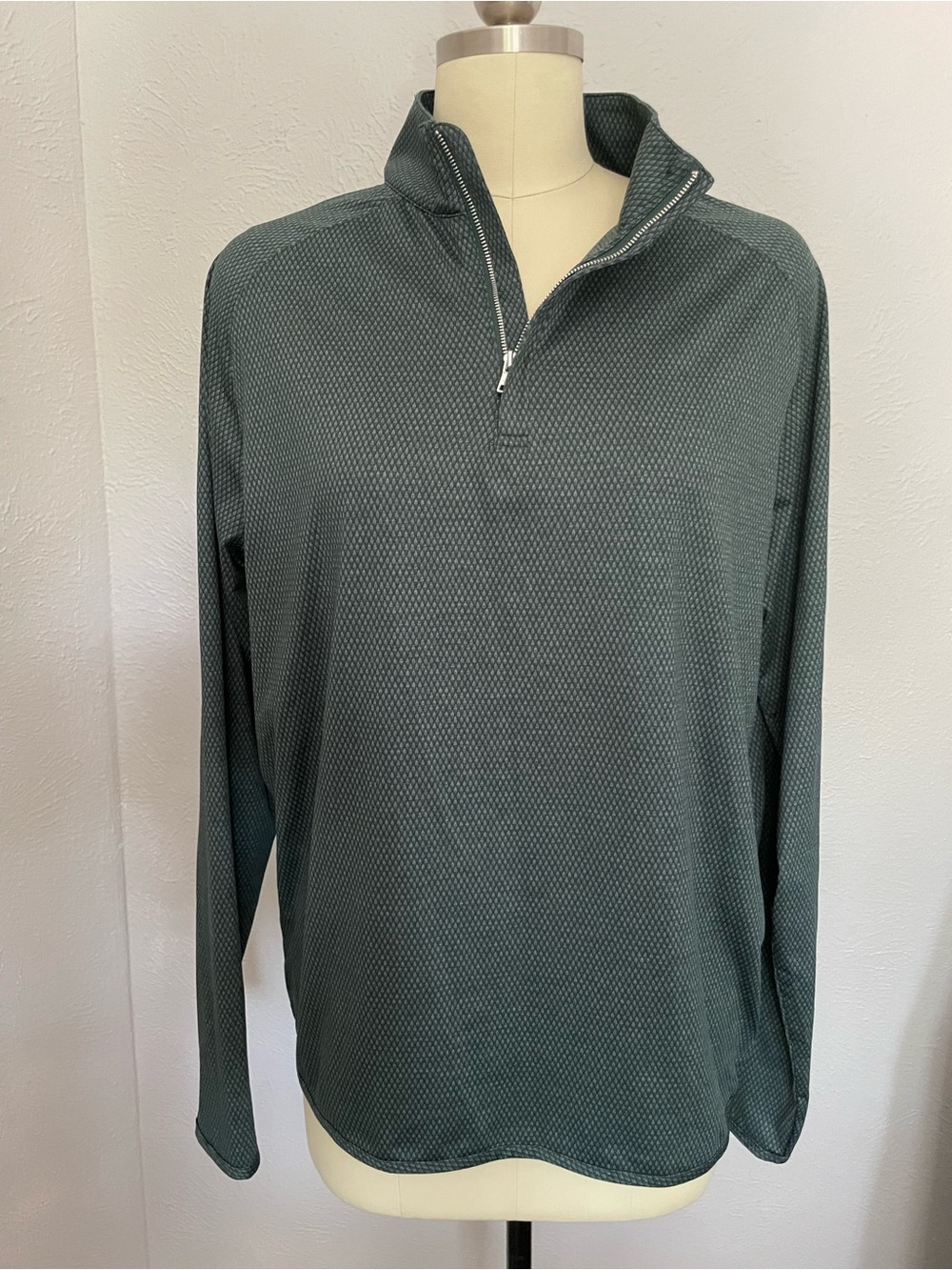 Peter Millar Navy Label on Textured Gray Fabric